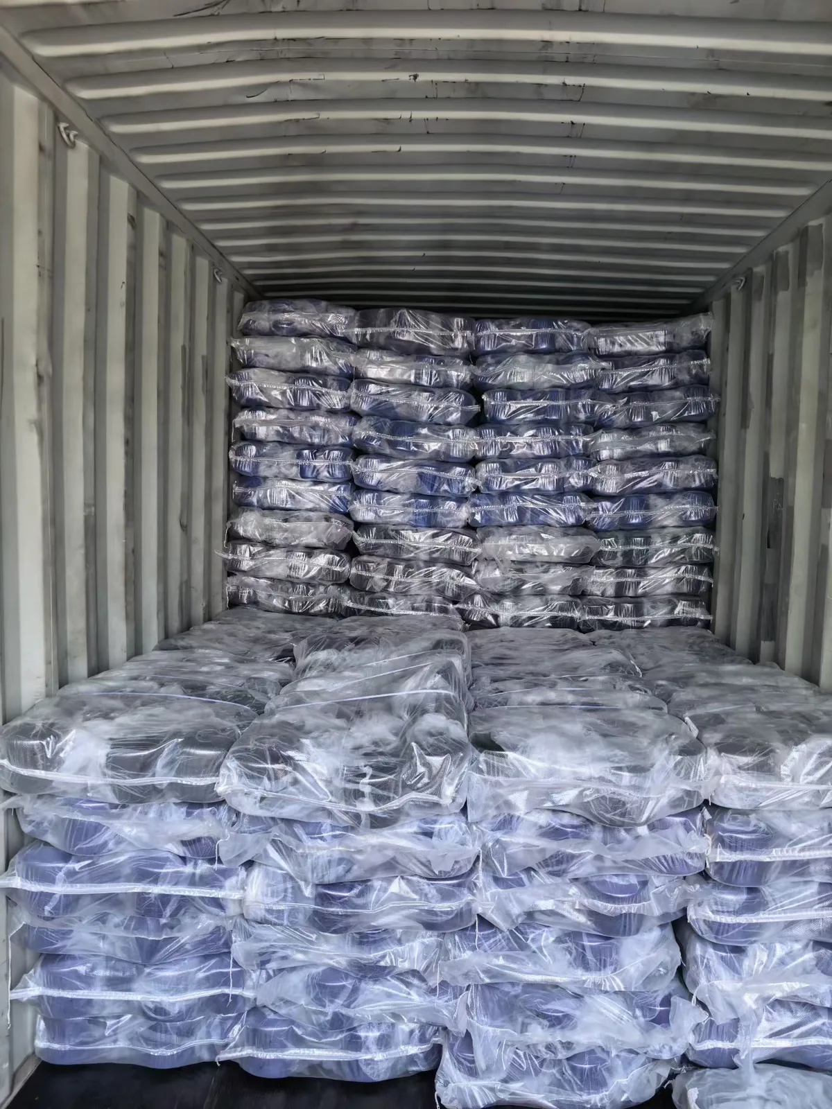 Packed yarn container loading